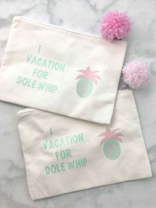 2 clutches white with dowl whip and a pineapple and a pink pompom. 