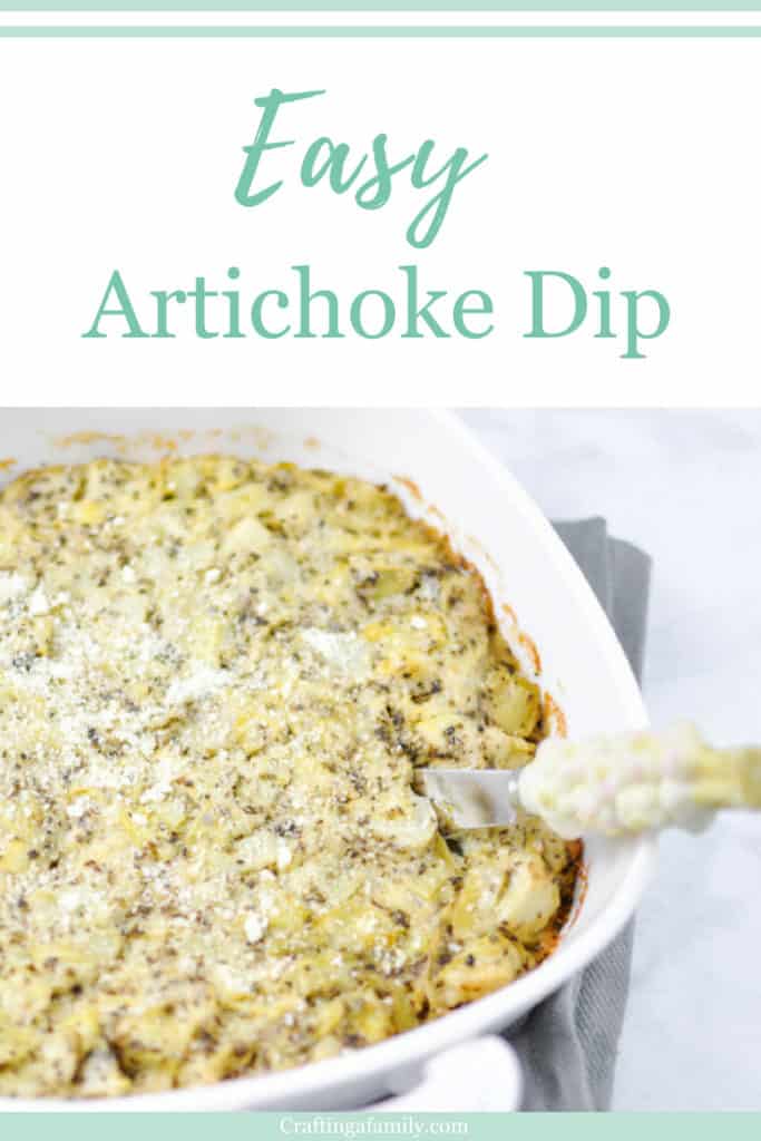 Cheesy Hot Artichoke Dip with crackers is perfect in the for any dinner party appetizer in a white baking dish. 