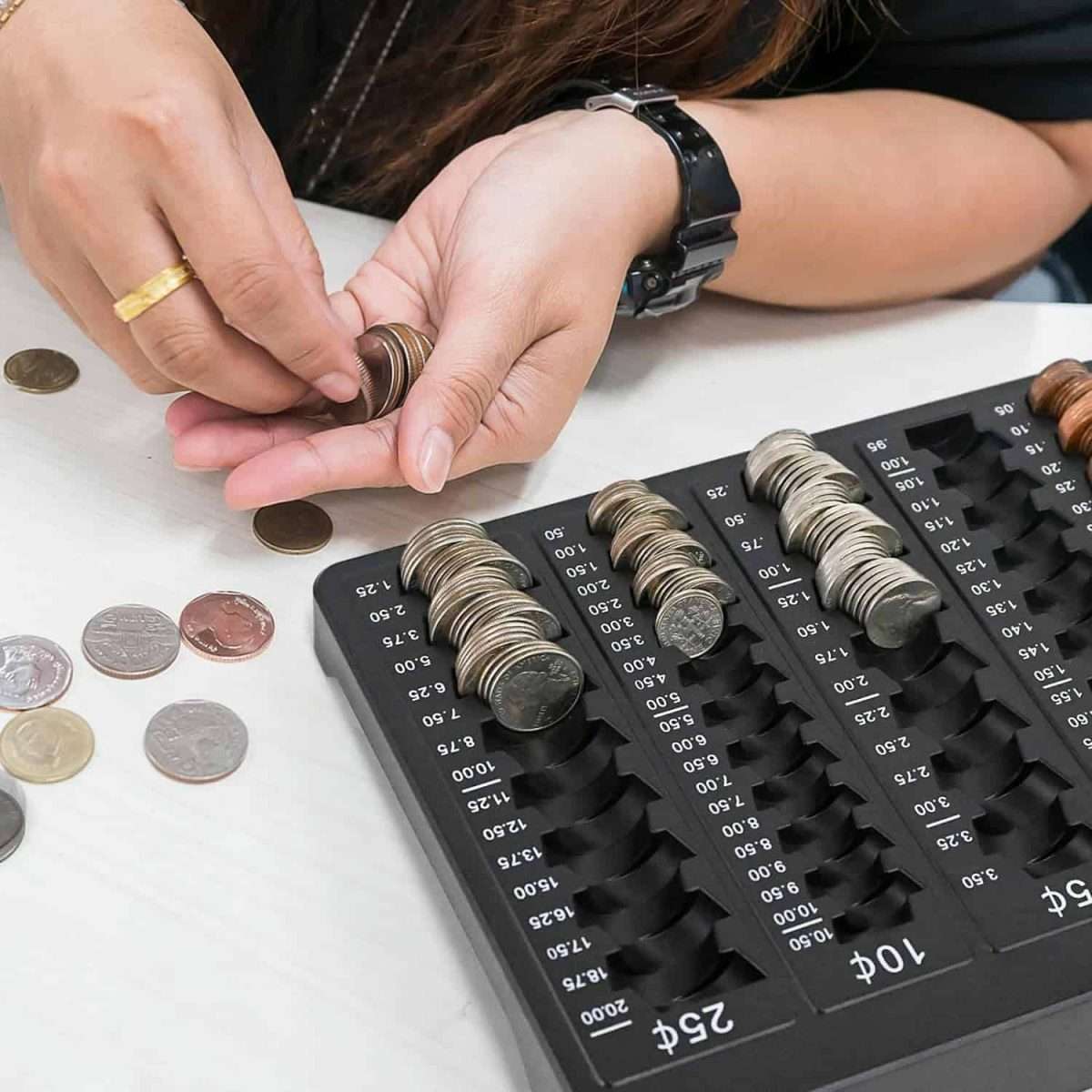 flat black tray for count coins.
