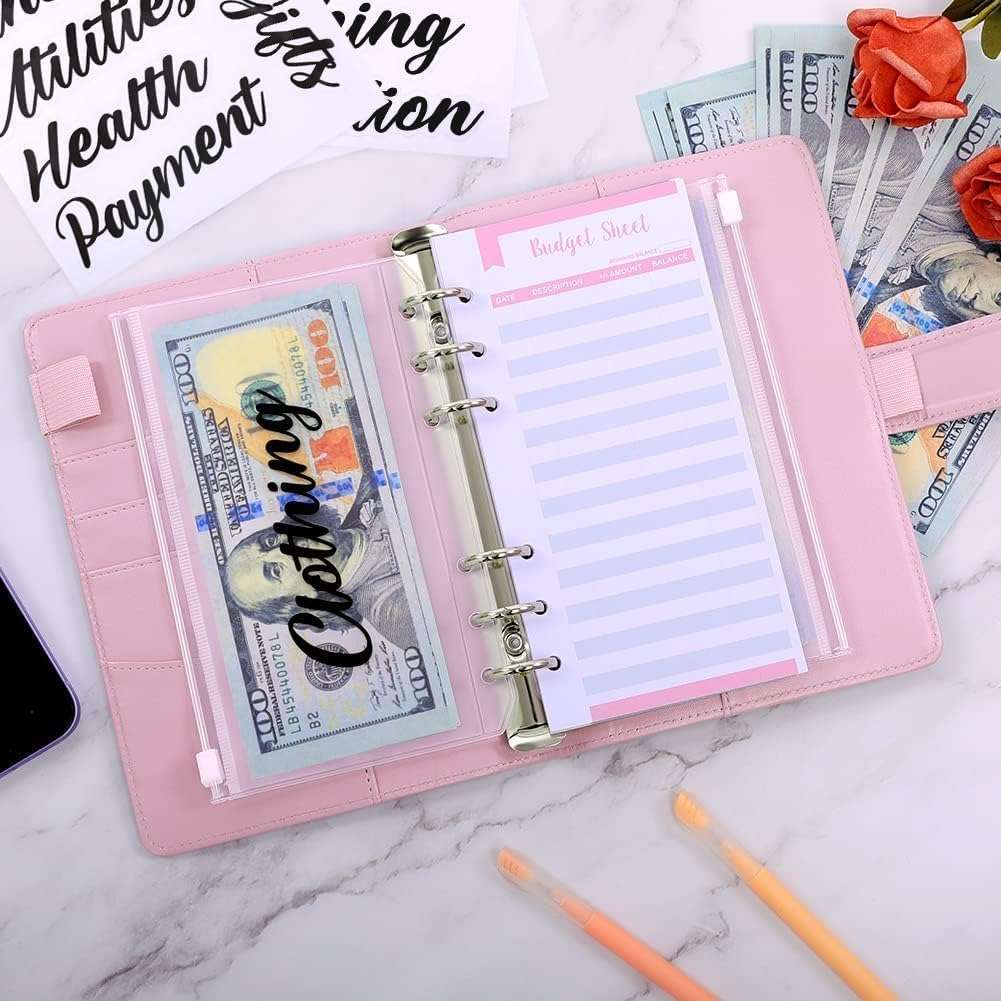 a pink budget envelope binder with stickers