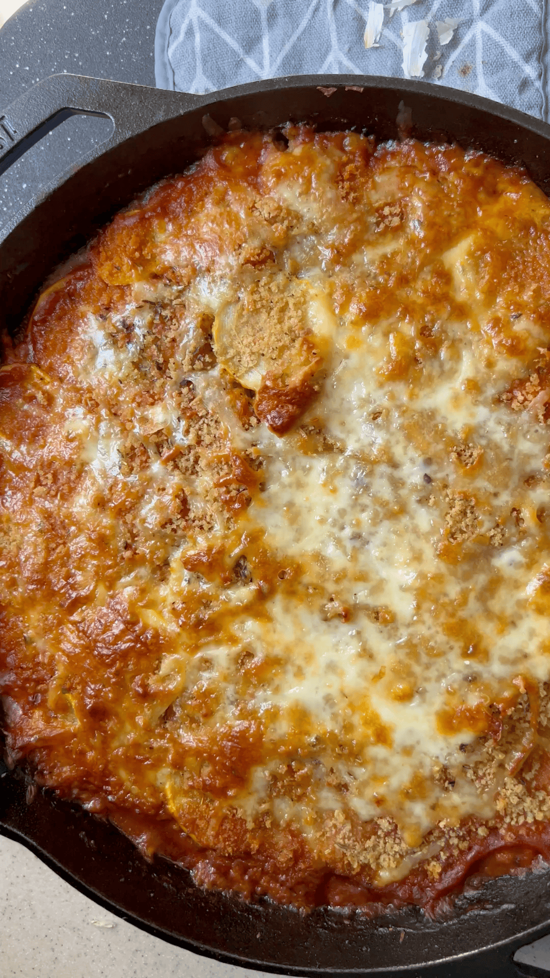 Easy Ground Beef Zucchini Skillet Casserole Low Carb whole casserole in the cast iron skillet right out of the oven top down view. 