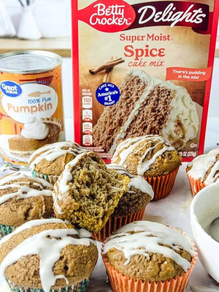 Easy pumpkin muffins with spice cake mix topped with maple glaze, made with canned pumpkin puree and Betty Crocker spice cake mix, a simple 6 ingredient pumpkin muffin recipe perfect as an easy fall dessert.