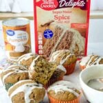 Easy pumpkin muffins with spice cake mix topped with maple glaze, made with canned pumpkin puree and Betty Crocker spice cake mix, a simple 6 ingredient pumpkin muffin recipe perfect as an easy fall dessert.