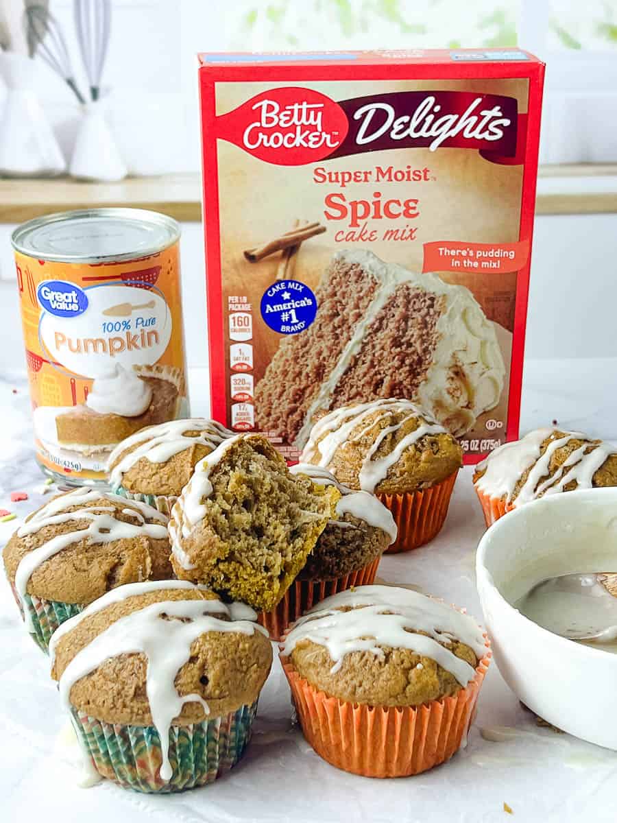 Easy pumpkin muffins with spice cake mix topped with maple glaze, made with canned pumpkin puree and Betty Crocker spice cake mix, a simple 6 ingredient pumpkin muffin recipe perfect as an easy fall dessert.